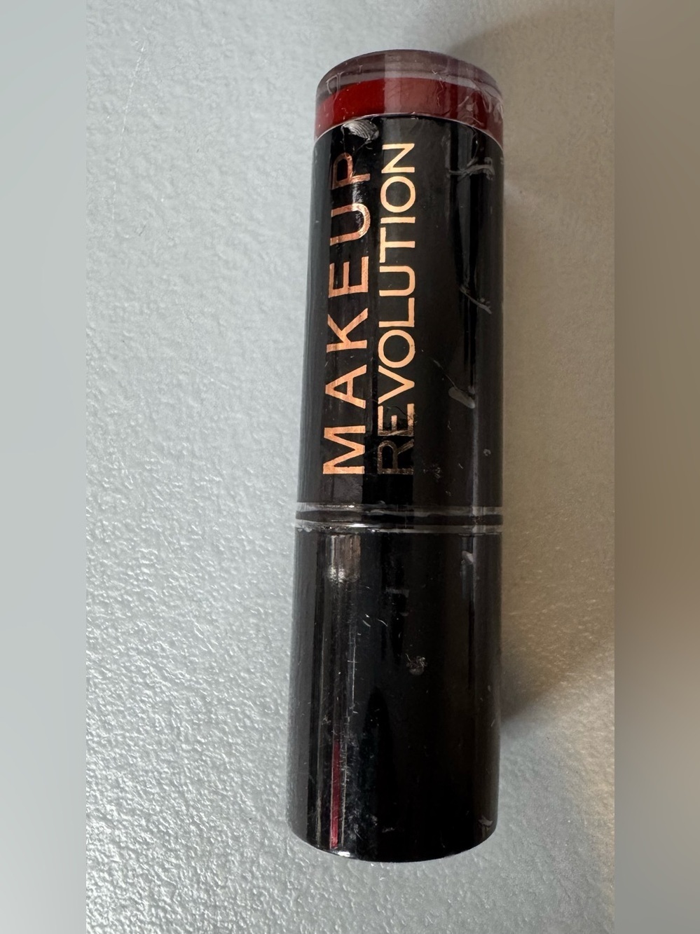 Makeup Revolution Lipstick in reckless Deep Red Shade burgundy
